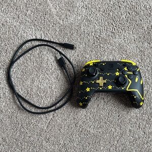 Nintendo Switch Controller - Black with Yellow Stars